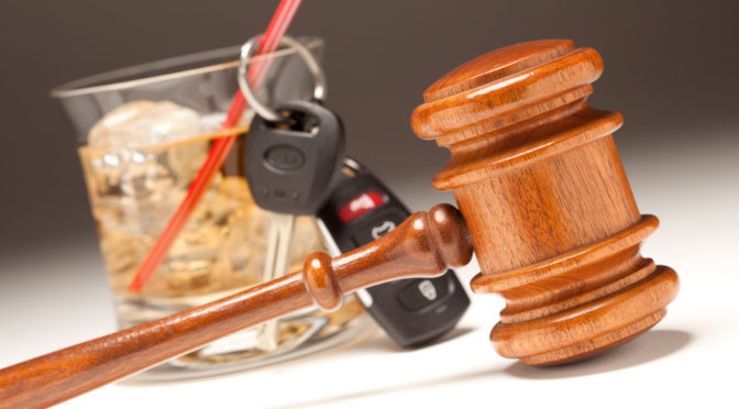 gavel, keys and alcohol